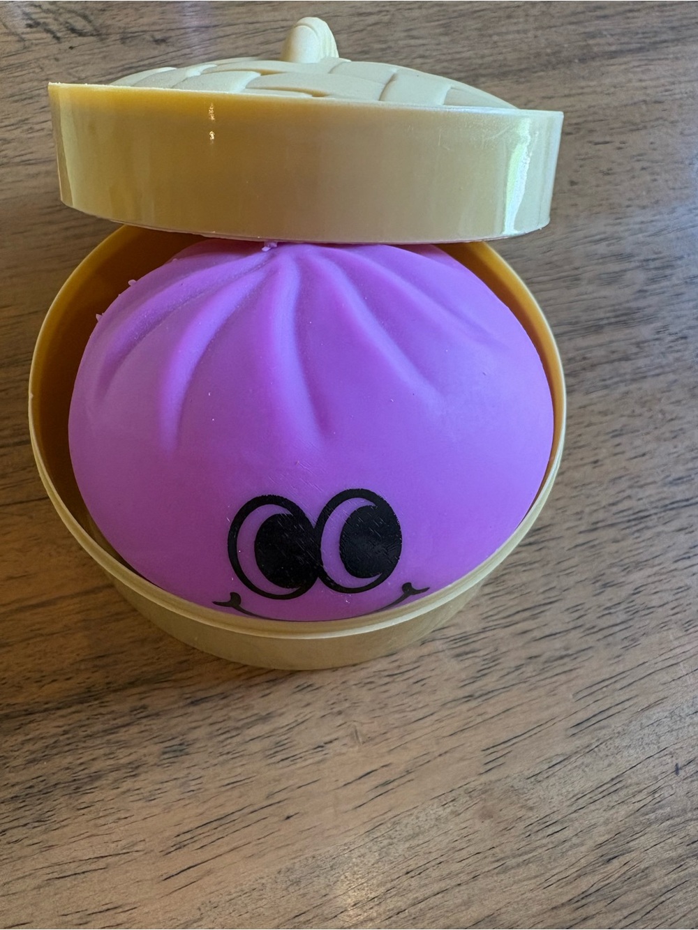 Purple Squishy Stress Ball in Yellow Shell